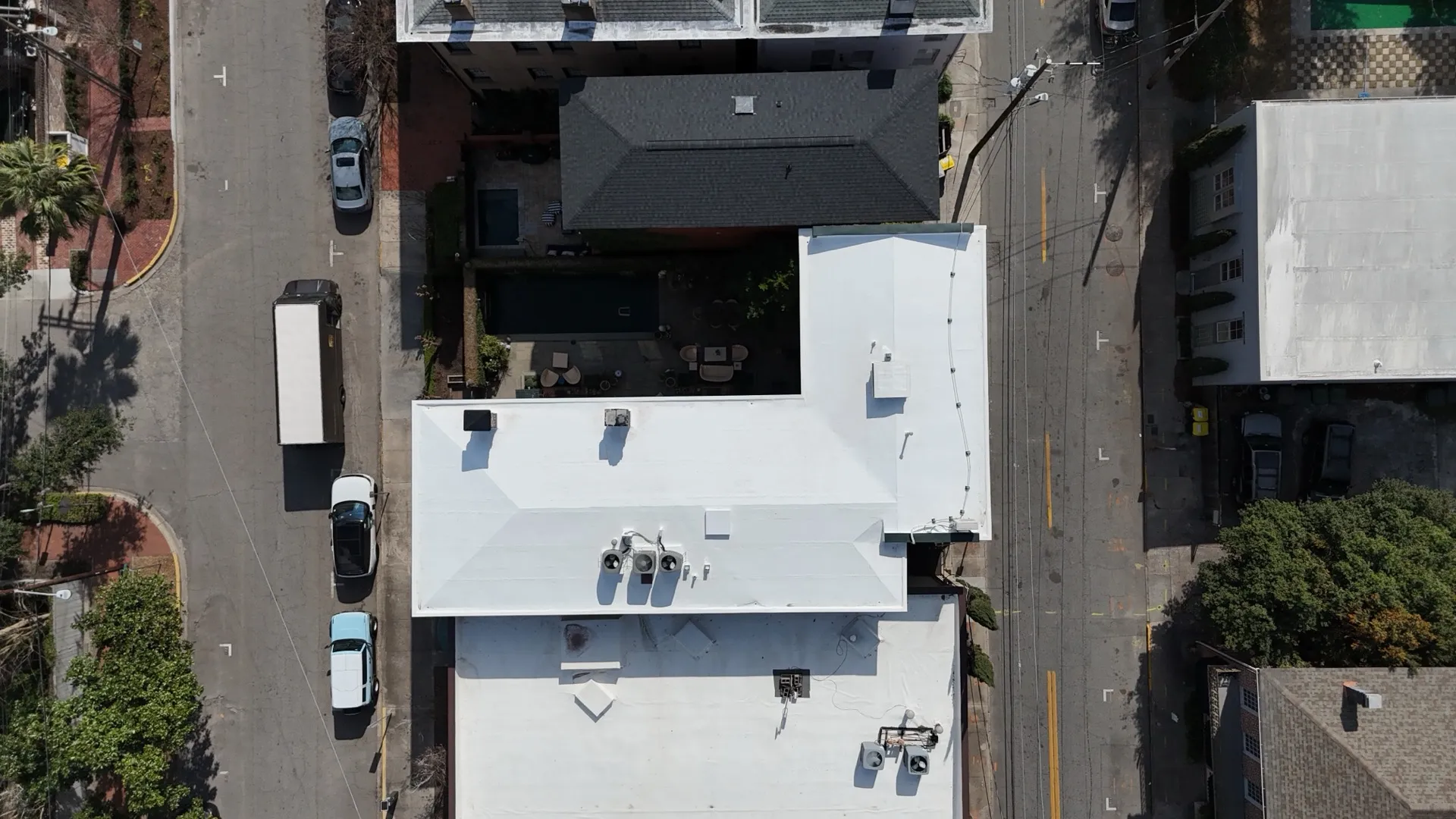 A roofer inspecting a roof in coastal Georgia