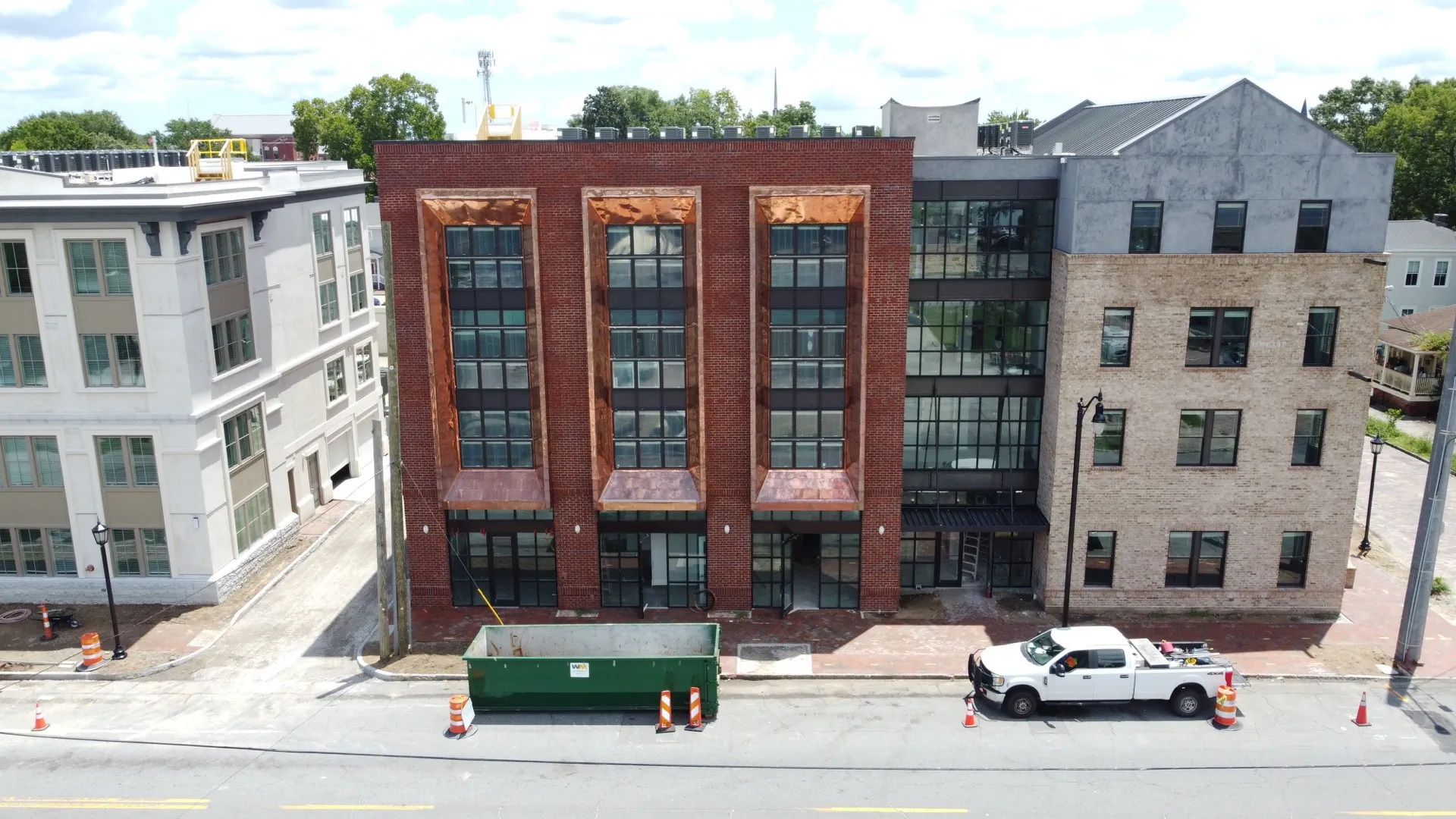 Aerial of twin commercial TPO roofs at The Addie